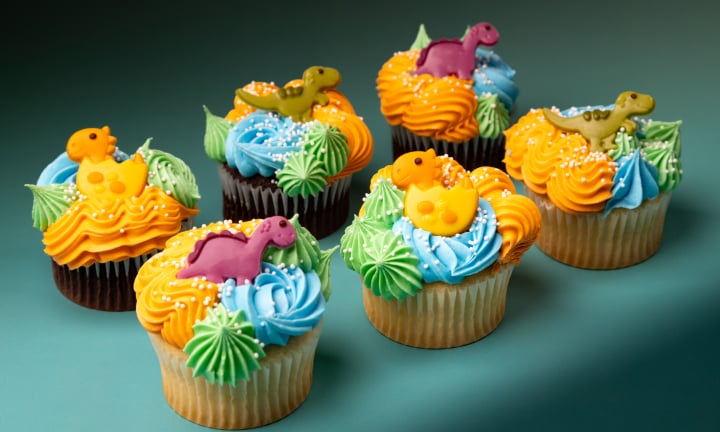 Graffiti Sprinkles dinosaurs cupcake with nonpareils